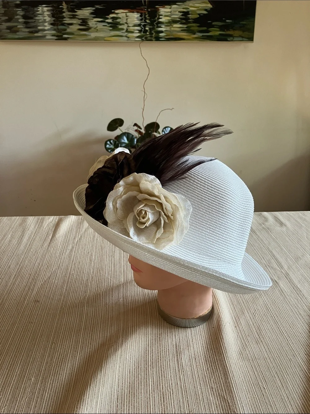 White Ladies Brim Hat with Brown and Cream Velvet Floral and Feather Accent